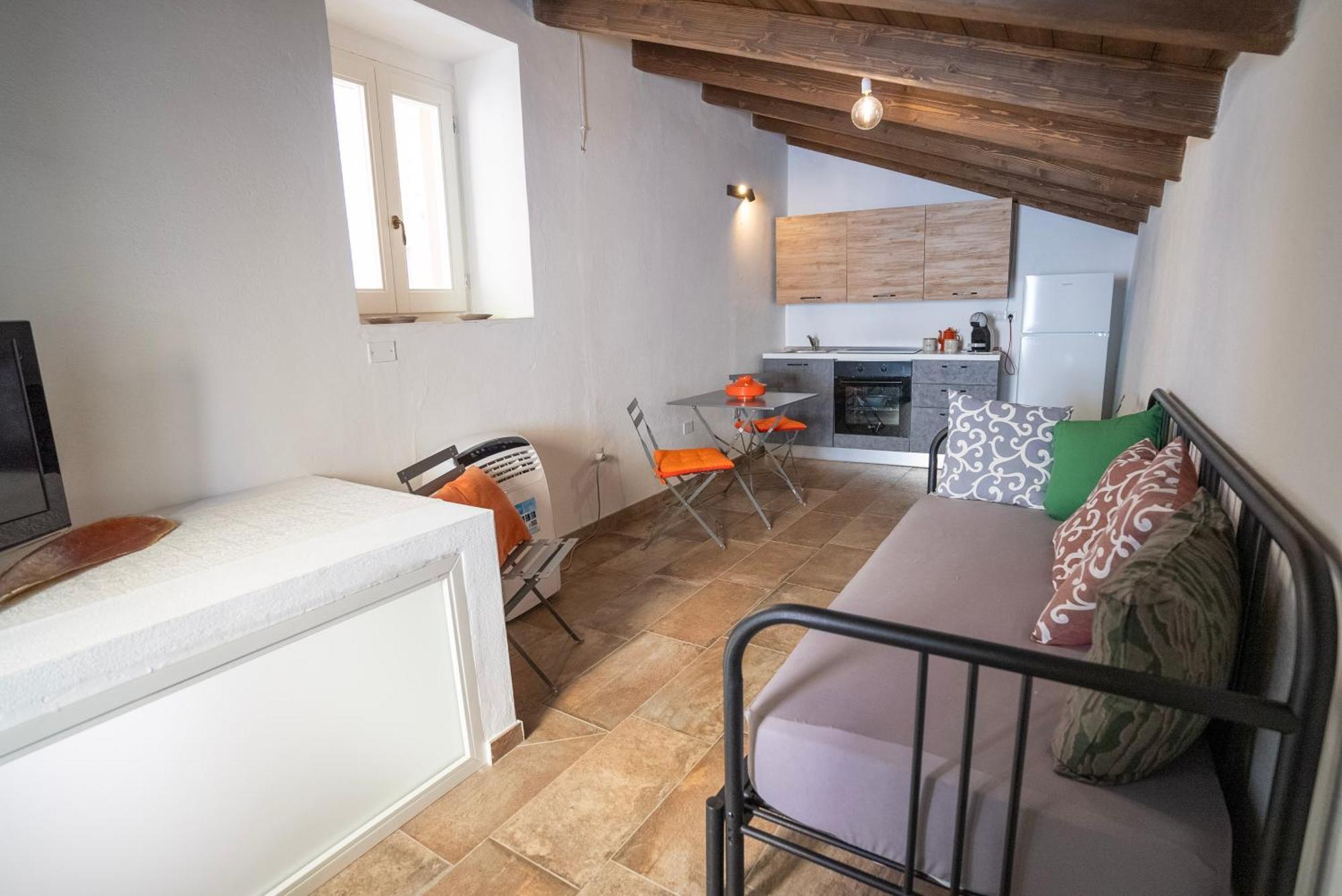 Sardinian Gallery Domus 博萨 客房 照片